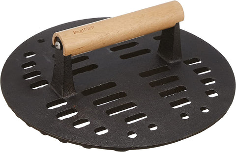 Cast iron slotted steak press